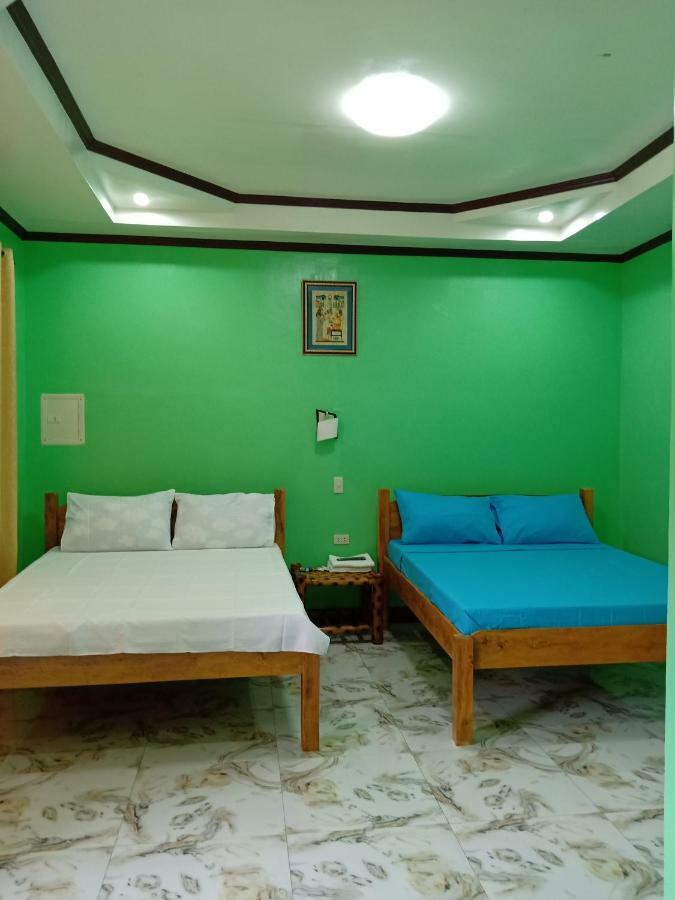 R&D Traveller'S Inn Anda  Exterior foto